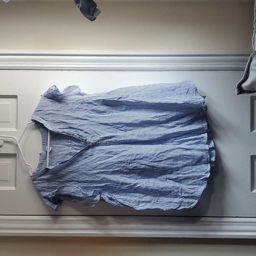 Blue and White sleeveless shirt